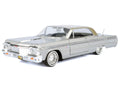 1964 Chevrolet Impala Lowrider Hard Top Silver Metallic with Gold Metallic Top "Get Low" Series 1/24 Diecast Model Car by Motormax