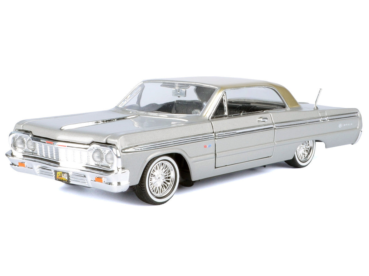 1964 Chevrolet Impala Lowrider Hard Top Silver Metallic with Gold Metallic Top "Get Low" Series 1/24 Diecast Model Car by Motormax